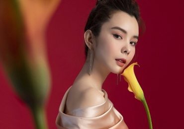 Hoa hậu Huỳnh Vy cuốn hút kiểu váy xếp tầng, đơn sắc