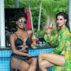 2 Hoa hậu Trái đất gợi cảm với bikini ngày hè