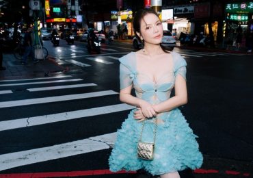 Lý Nhã Kỳ khoe trọn bờ vai quyến rũ trên đường phố